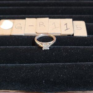 Item # GR115  Platinum 4 small Square cut diamonds ring size 7
